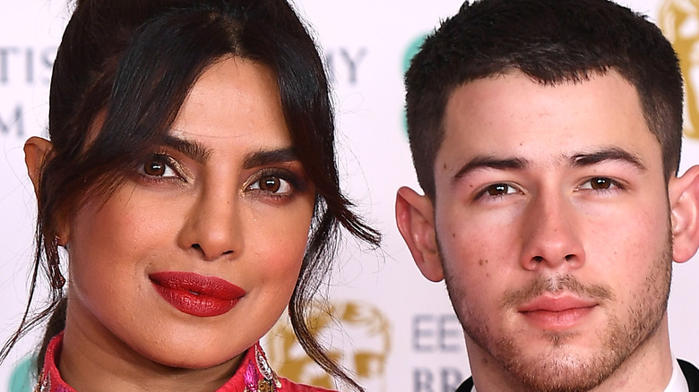 Priyanka Chopra and Nick Jonas with slight smiles