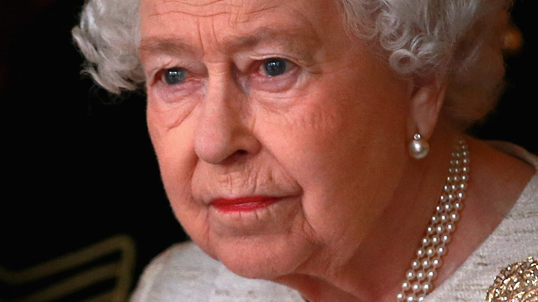 Queen Elizabeth II looking concerned