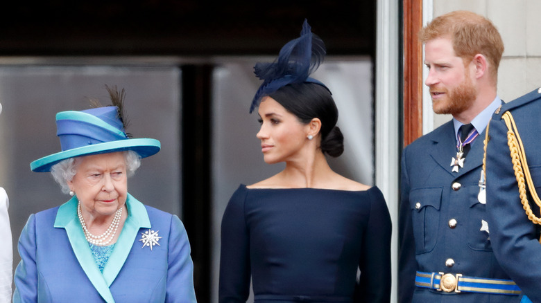 Queen Elizabeth with Meghan Markle and Prince Harry