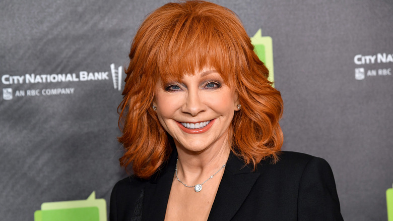 Reba McEntire grinning