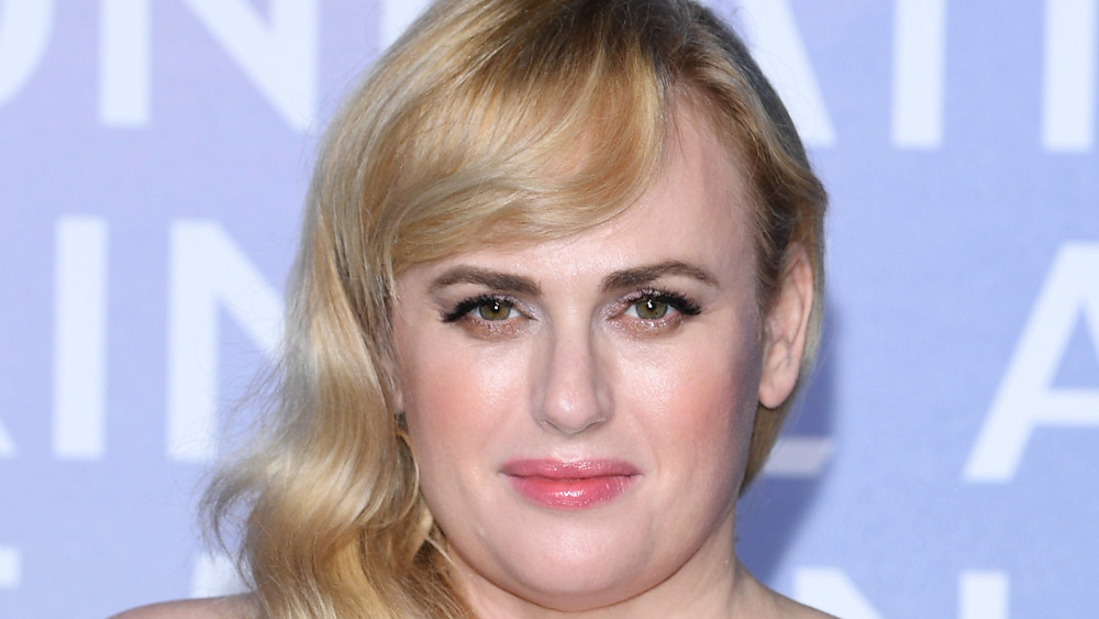 Rebel Wilson smirking