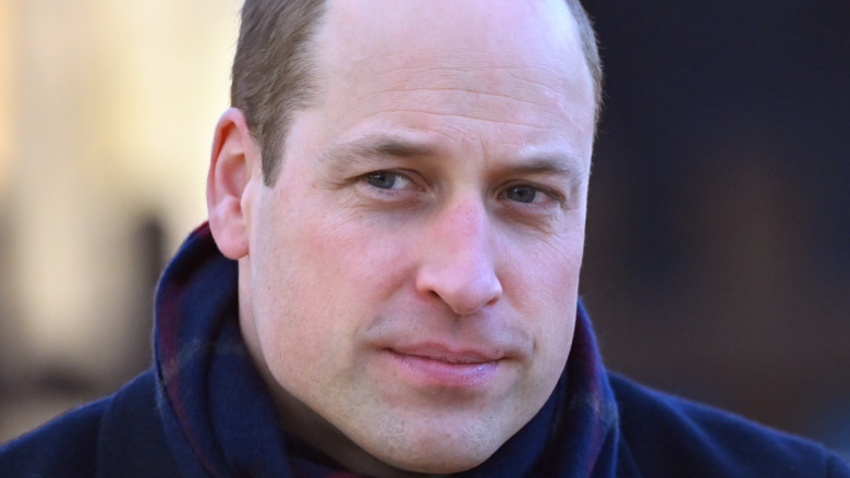 Prince William smirks 