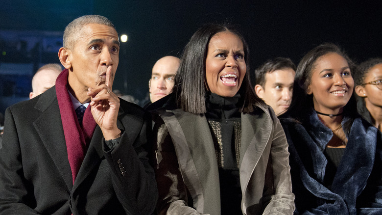 Sasha Obama with Barack Obama and Michelle Obama