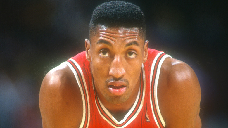 Scottie Pippen bending over on the court