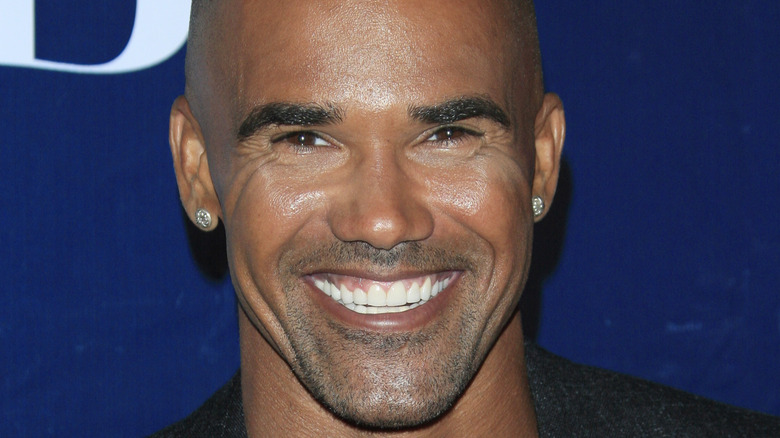 Shemar Moore smiles on red carpet