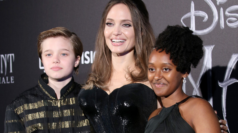Shiloh Jolie Pitt with her mom and sister