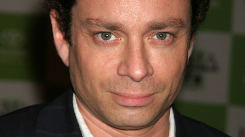 Chris Kattan slightly smiling