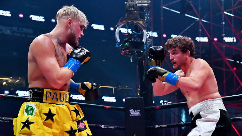 Jake Paul and Ben Askren fighting