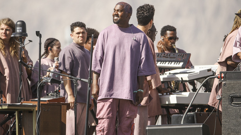 Kanye West standing tall