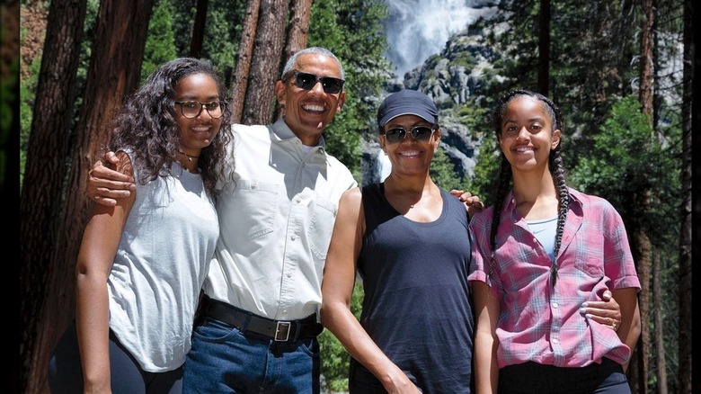 The Obamas posing in the forrest