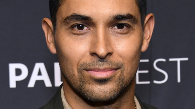 Wilmer Valderrama smiling on the red carpet