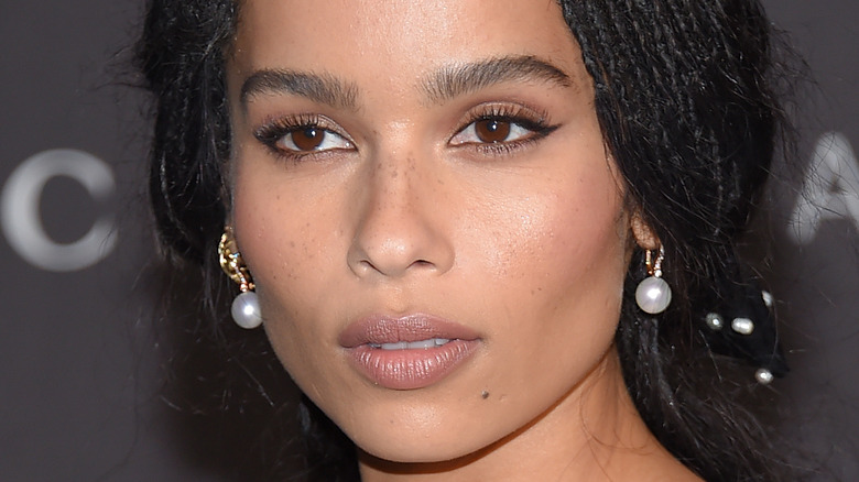 Zoe Kravitz with a serious expression