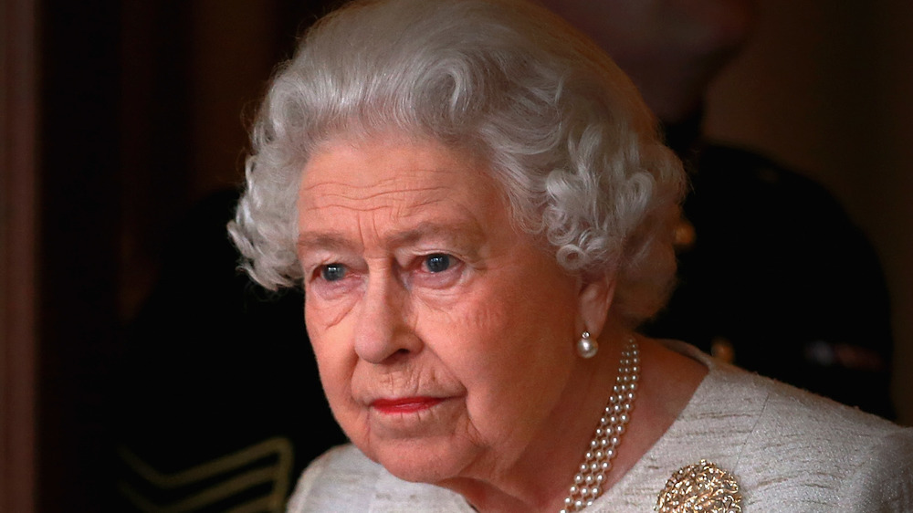 Queen Elizabeth looking upset