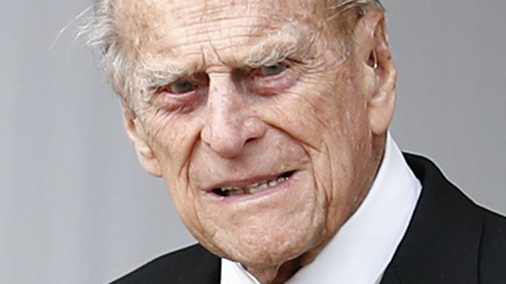 Prince Philip poses for a photo