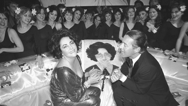 Elizabeth Taylor and Halston at her birthday party at Studio 54