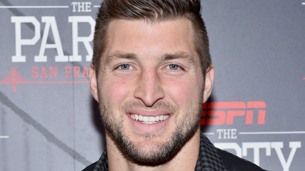 Tim Tebow smiling at an ESPN event