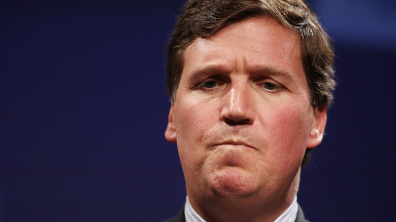 Tucker Carlson frowning