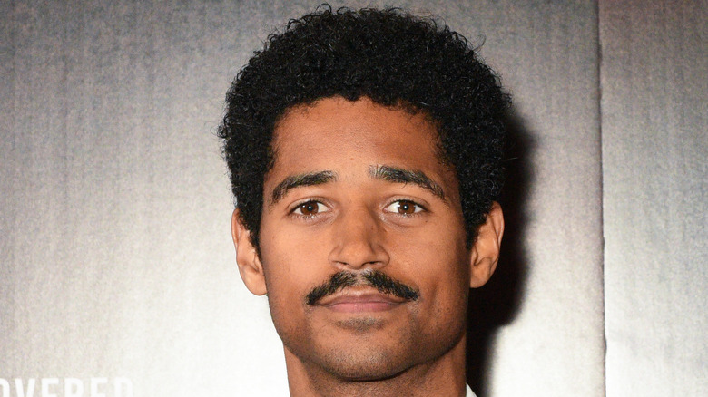 Alfred Enoch posing