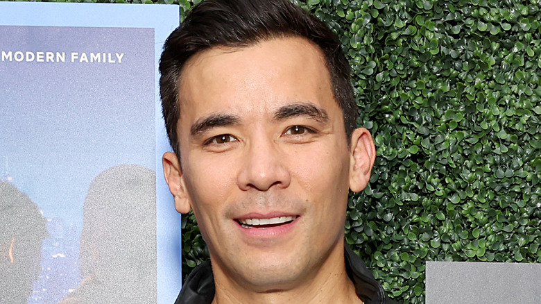 Conrad Ricamora smiling