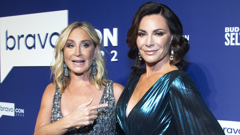 Sonja Morgan pointing Luann de Lesseps smiling