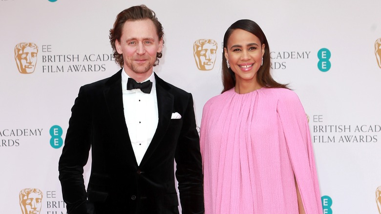 Tom Hiddleston and Zawe Ashton smiling