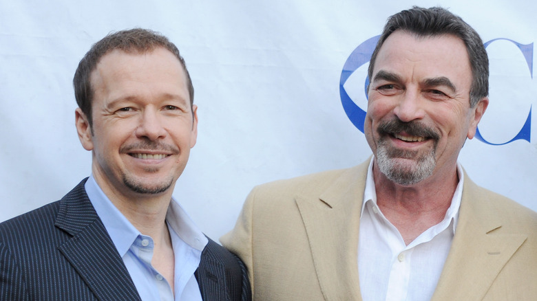 Tom Selleck and Donnie Wahlberg smiling