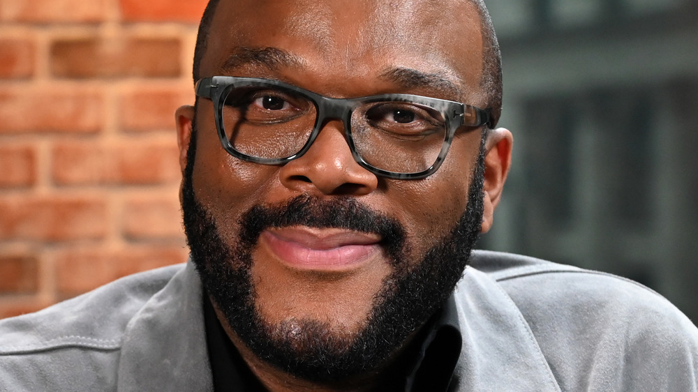 Tyler Perry wearing glasses during an interview