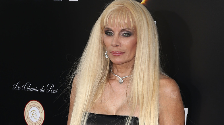 Victoria Gotti black strapless dress