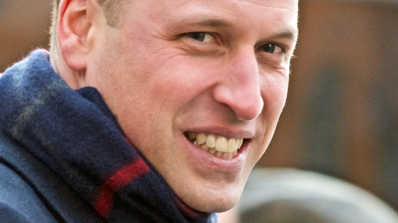 Prince William smiling at event 