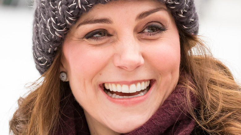 Kate Middleton wool hat diamond earrings smiling