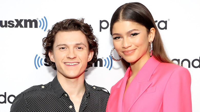 Tom Holland posing with Zendaya