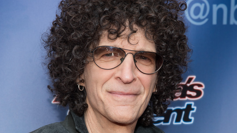 Howard Stern slightly smiling