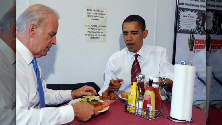 Barack Obama eats burger with Joe Biden in May 2009