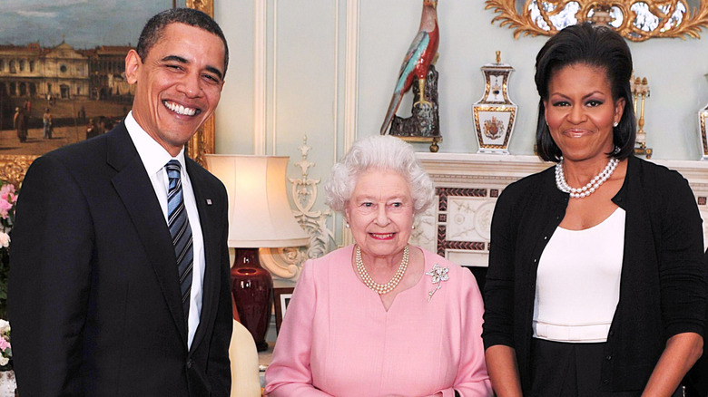 Barack and Michelle Obama pose with Elizabeth II in 2009