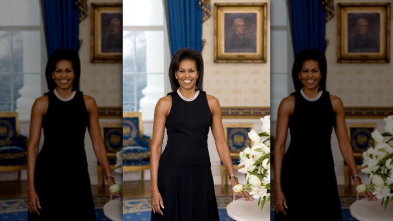 Michelle Obama poses in black sleeveless dress for first official portrait in 2009