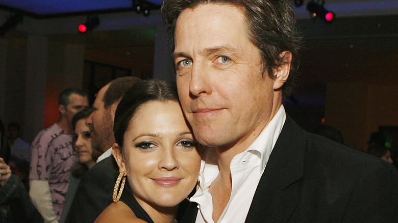 Drew Barrymore and Hugh Grant smiling