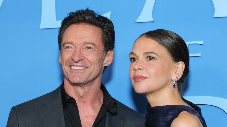Hugh Jackman posing with Sutton Foster