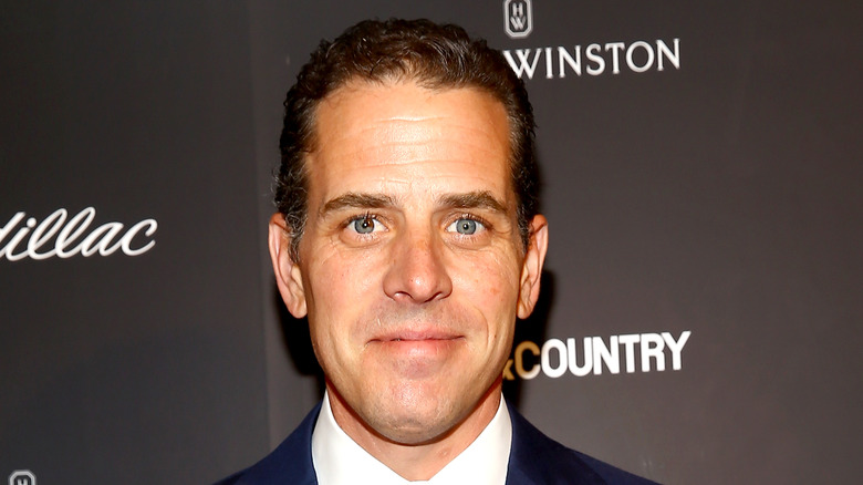 Hunter Biden poses in a suit