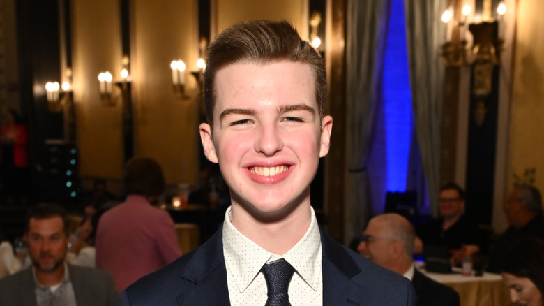 Iain Armitage posing at an event.