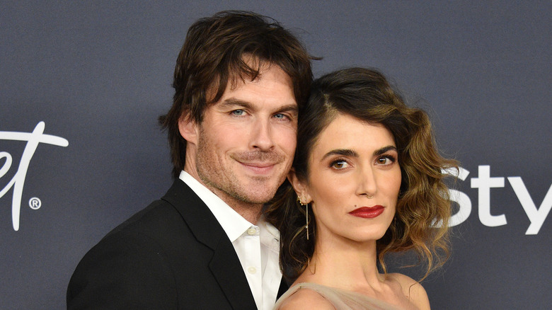 Ian Somerhalder and Nikki Reed posing