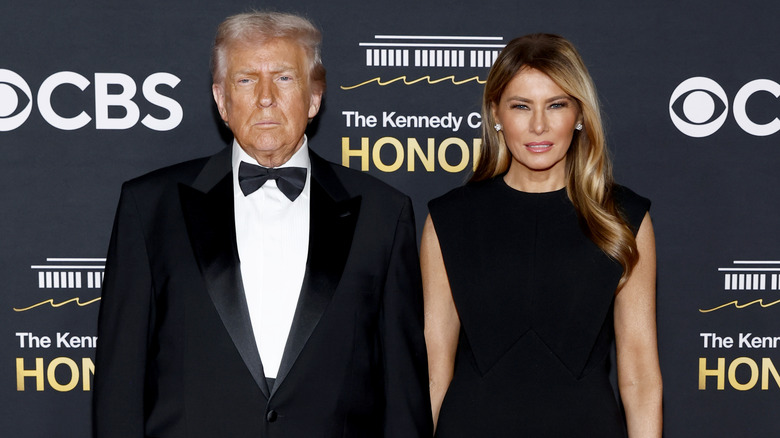 Donald Trump and Melania Trump pose for a photo