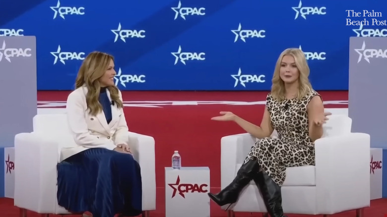 Karoline Leavitt speaking on stage at CPAC 2025