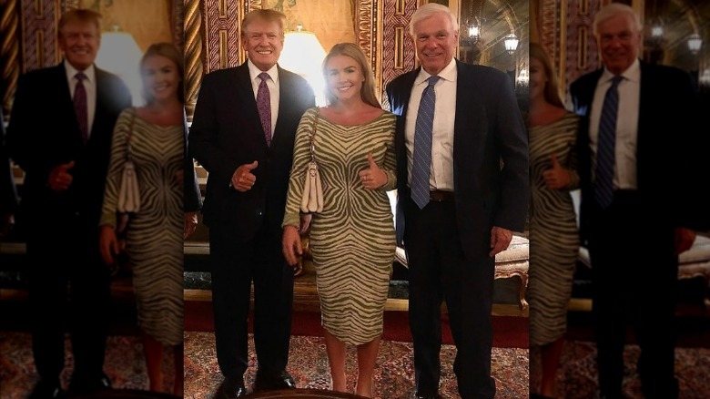 Karoline Leavitt posing with Donald Trump at Mar-a-Lago