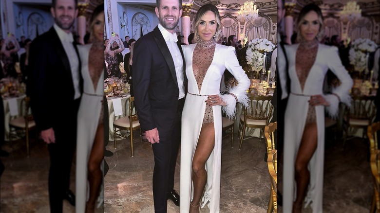Lara Trump standing with Eric Trump in thigh split dress