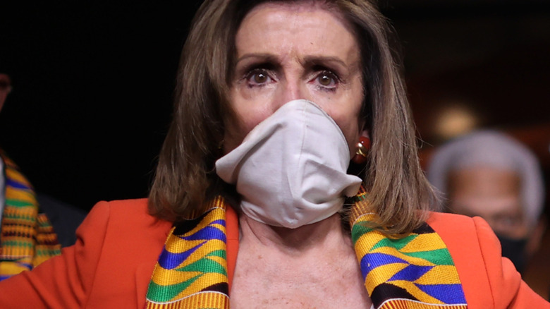 Nancy Pelosi wears Kente cloth