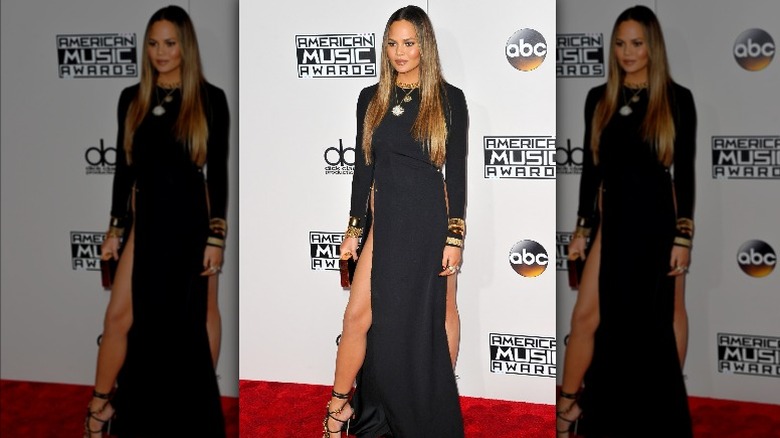 Chrissy Teigen wearing black dress