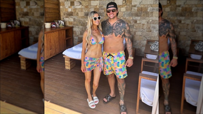 Christina and Josh Hall in swimsuits