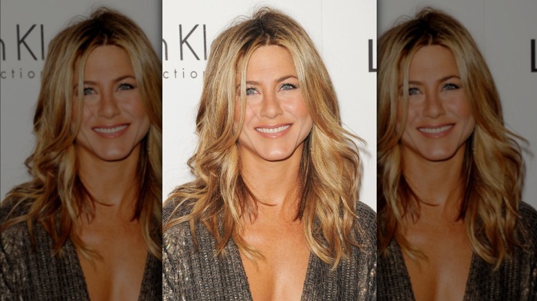 Jennifer Aniston silver dress smiling