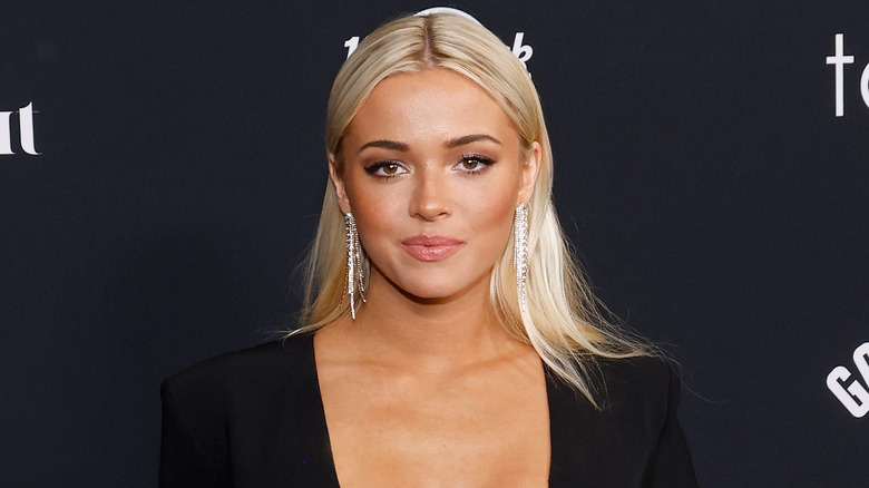 Olivia Dunne wearing chandelier earrings