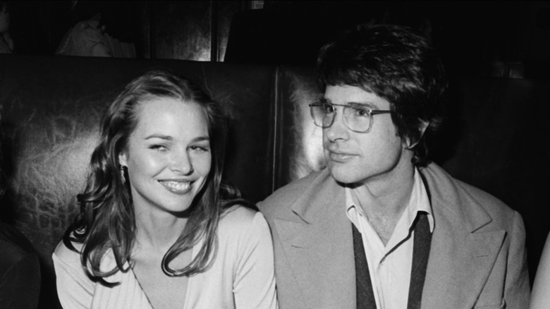 Michelle Phillips and Warren Beatty attend the opening night party for Man in the Moon in the 1970s